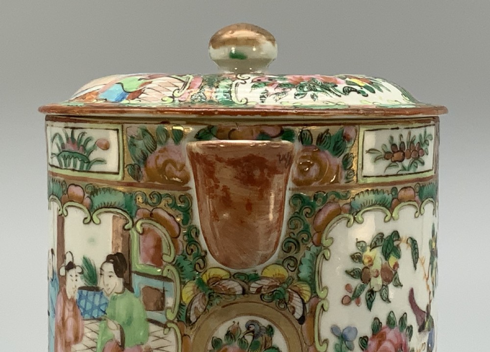 A 19th-century Chinese export porcelain barrel-form coffee pot with cover, decorated with famille rose enamel figural reserves and floral patterns. View XII