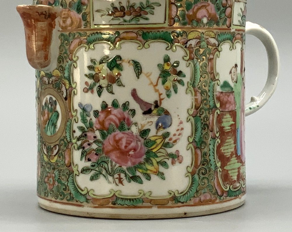 A 19th-century Chinese export porcelain barrel-form coffee pot with cover, decorated with famille rose enamel figural reserves and floral patterns. View XIII