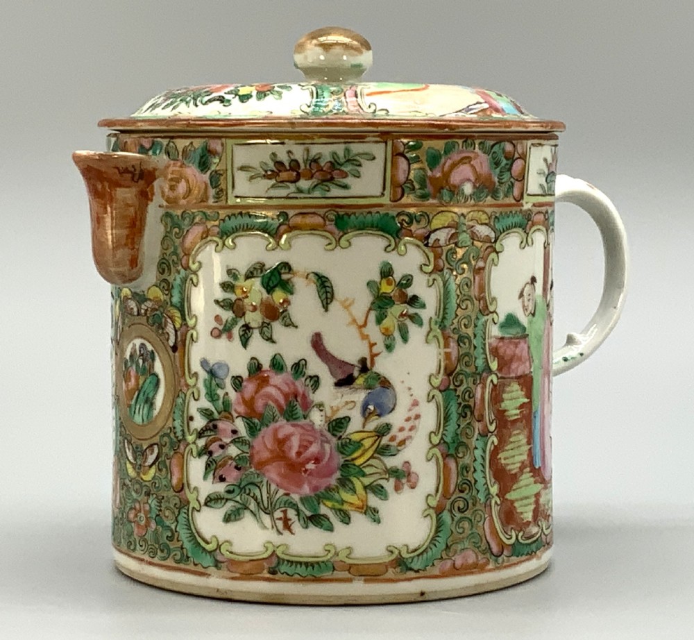 A 19th-century Chinese export porcelain barrel-form coffee pot with cover, decorated with famille rose enamel figural reserves and floral patterns. View XIV