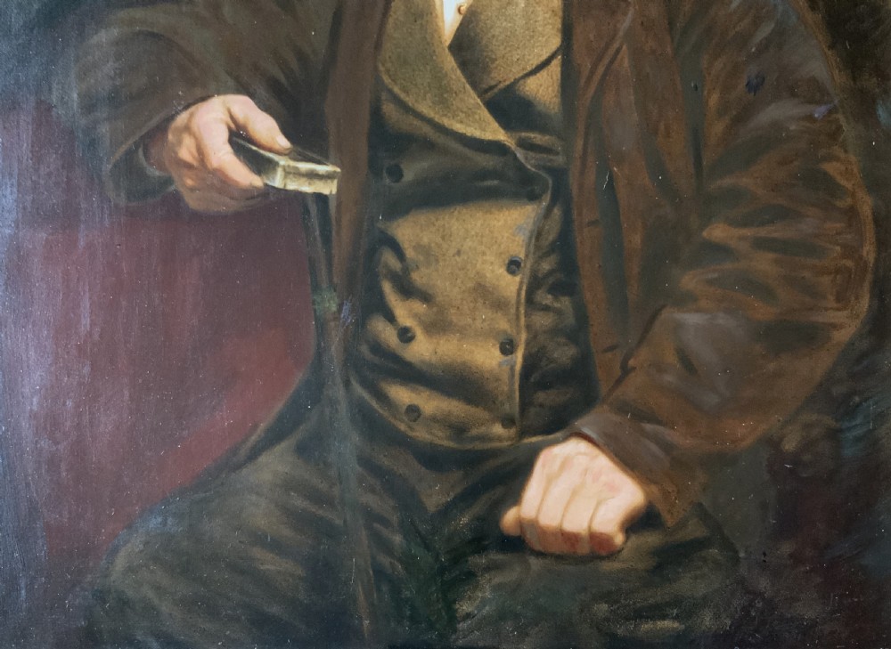 A 19th-century oil painting depicting a seated gentleman in a brown coat and waistcoat holding a small book, encased in an ornate gilded frame. View VIII