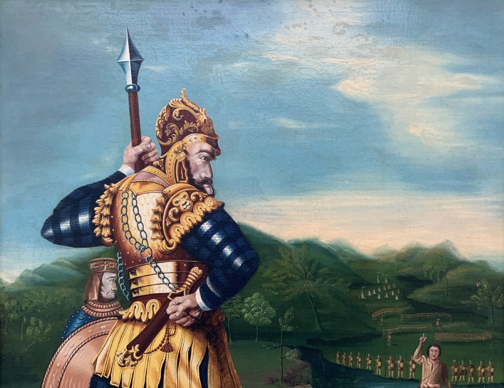 An antique framed oil painting depicting Goliath clad in ornate gold and blue armour holding a spear, with David standing across a stream in the background. View IV