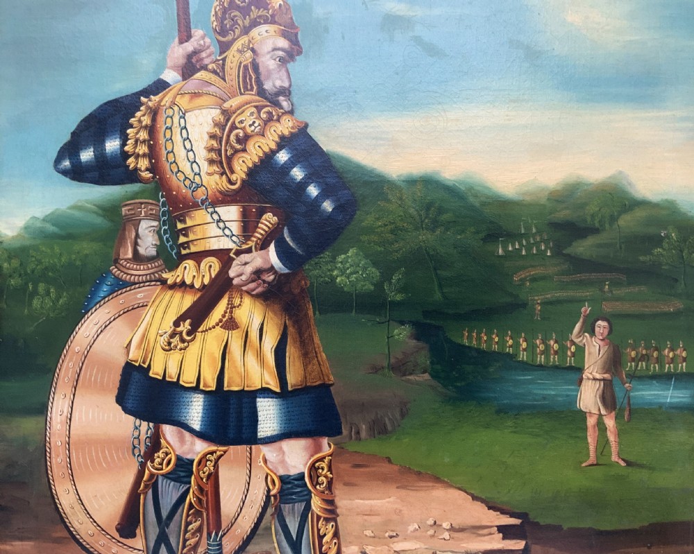 An antique framed oil painting depicting Goliath clad in ornate gold and blue armour holding a spear, with David standing across a stream in the background. View V