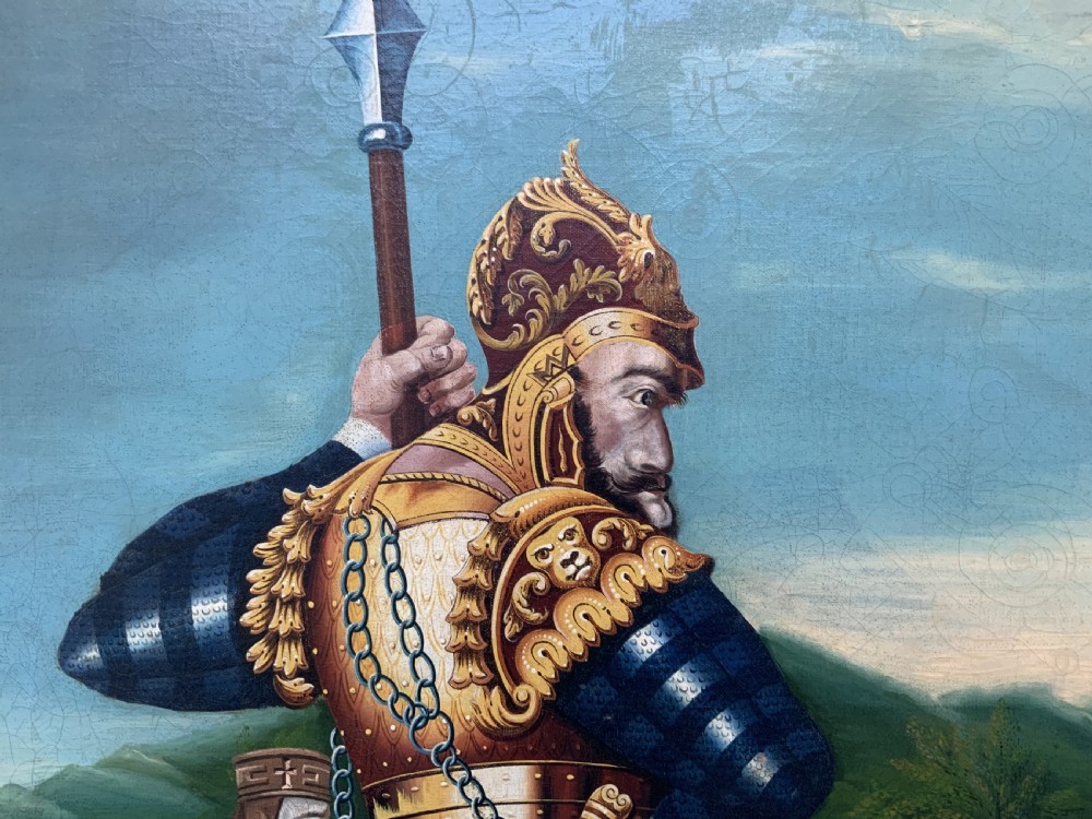 An antique framed oil painting depicting Goliath clad in ornate gold and blue armour holding a spear, with David standing across a stream in the background. View XII
