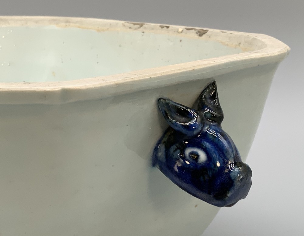 An 18th-century Chinese export porcelain jardiniere decorated with hand-painted floral motifs in cobalt blue and iron-red with blue side handles. View VIII