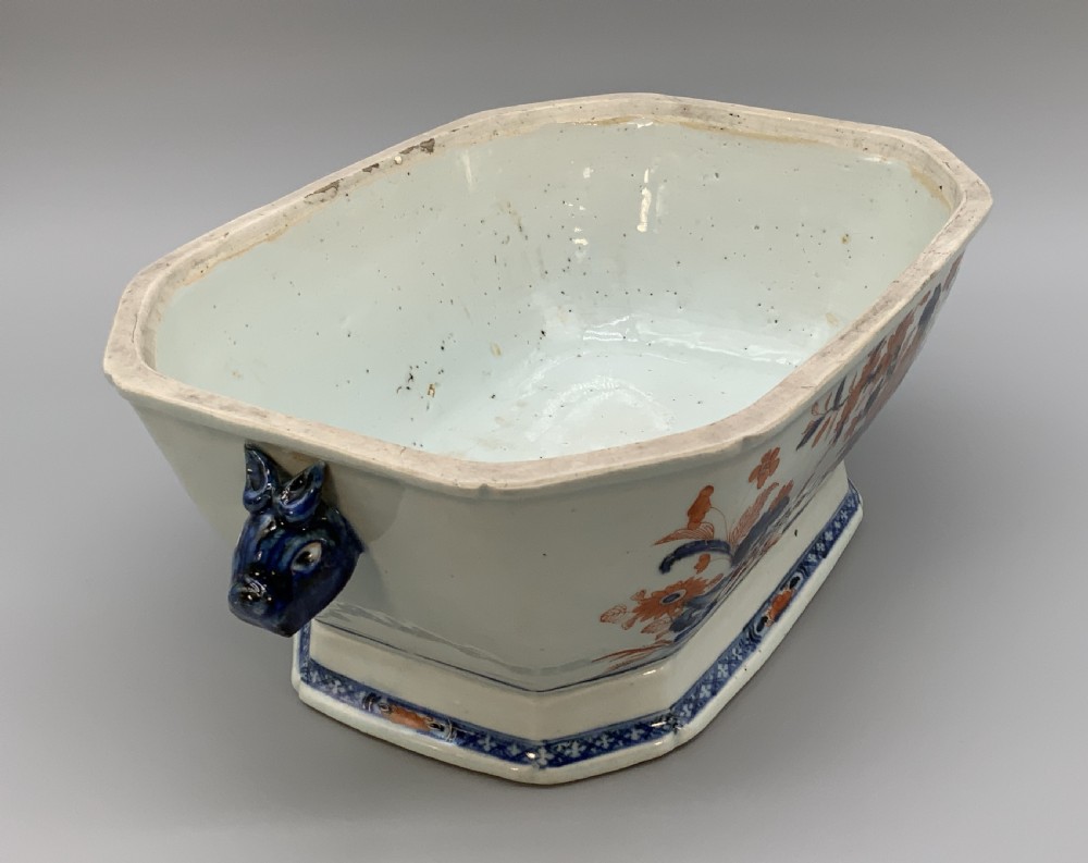 An 18th-century Chinese export porcelain jardiniere decorated with hand-painted floral motifs in cobalt blue and iron-red with blue side handles. View IX