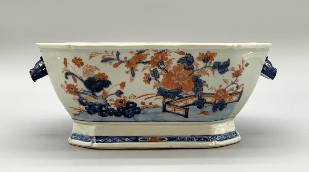 An 18th-century Chinese export porcelain jardiniere decorated with hand-painted floral motifs in cobalt blue and iron-red with blue side handles. View XIII