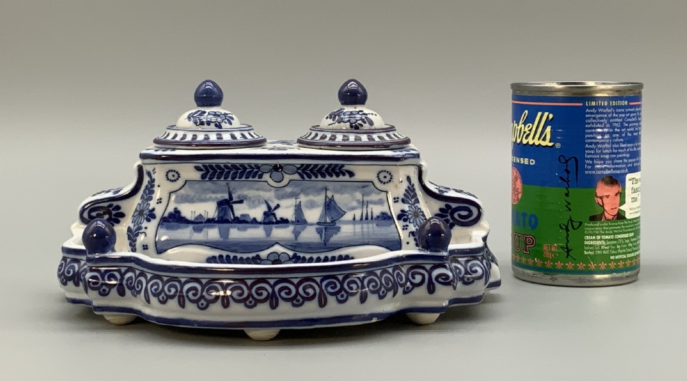 A late nineteenth-century Dutch Delft blue and white ceramic inkstand featuring twin removable lids, an integrated pen tray, and hand-painted windmill landscape scenes. View IV