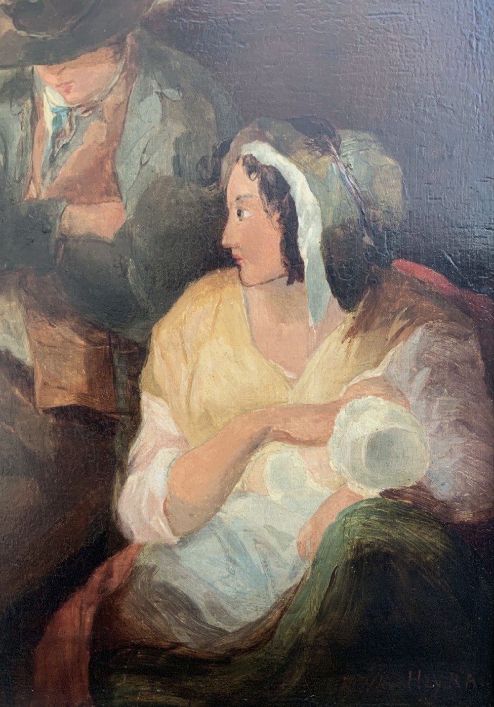 A late 19th-century Victorian oil painting on canvas depicting a seated mother nursing a child alongside a man in shadow, presented in a silvered gilt wood frame. View VIII