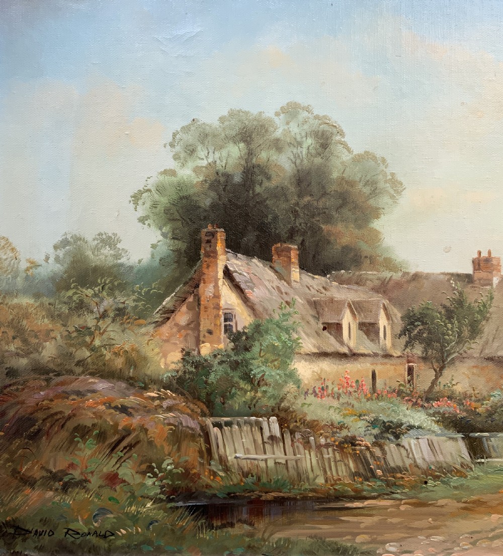 An oil painting depicting a thatched cottage along a dirt lane, housed inside an ornate swept gilt frame with scroll motifs. View VIII