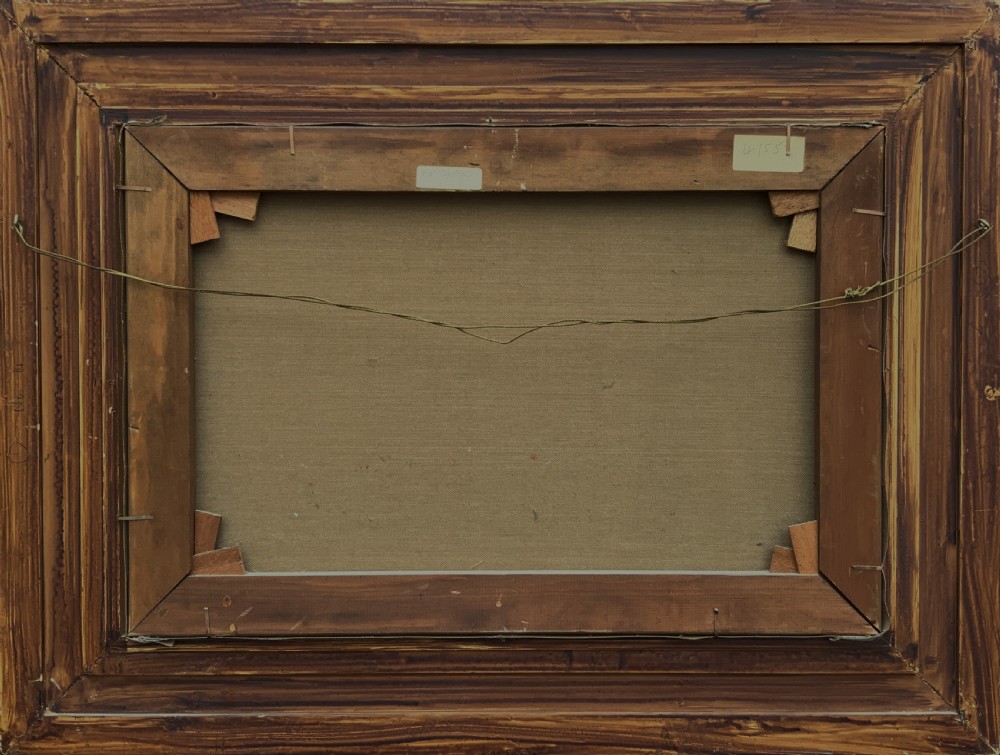 An oil painting depicting a thatched cottage along a dirt lane, housed inside an ornate swept gilt frame with scroll motifs. View XI
