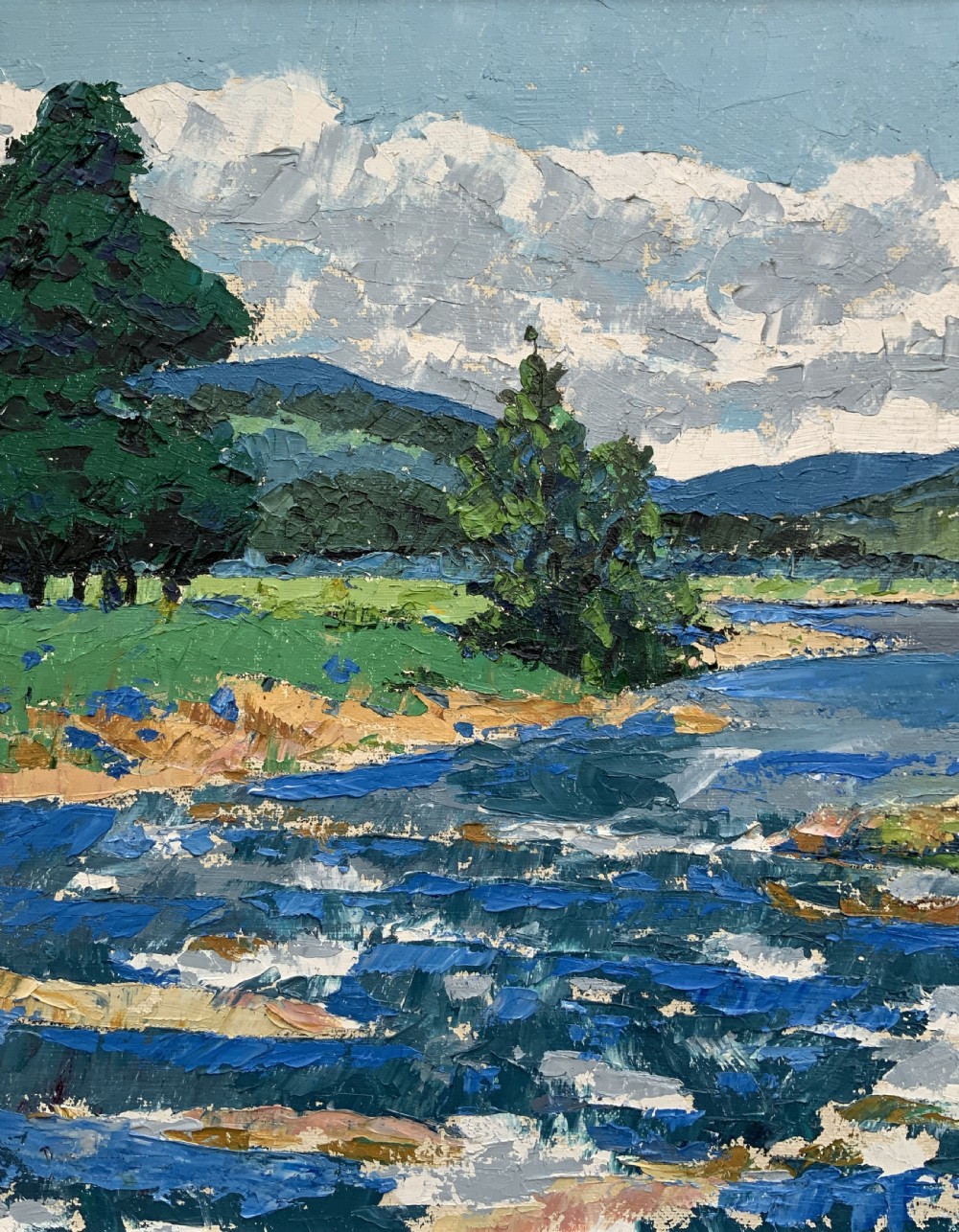A framed mid-century impressionist oil painting depicting a blue river flowing through a green landscape with trees and hills under a cloudy sky. View VII