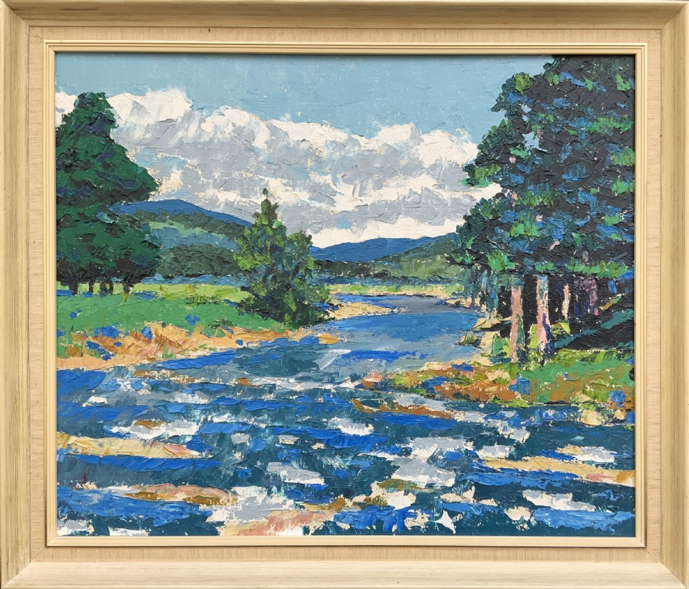 A framed mid-century impressionist oil painting depicting a blue river flowing through a green landscape with trees and hills under a cloudy sky. View XIV