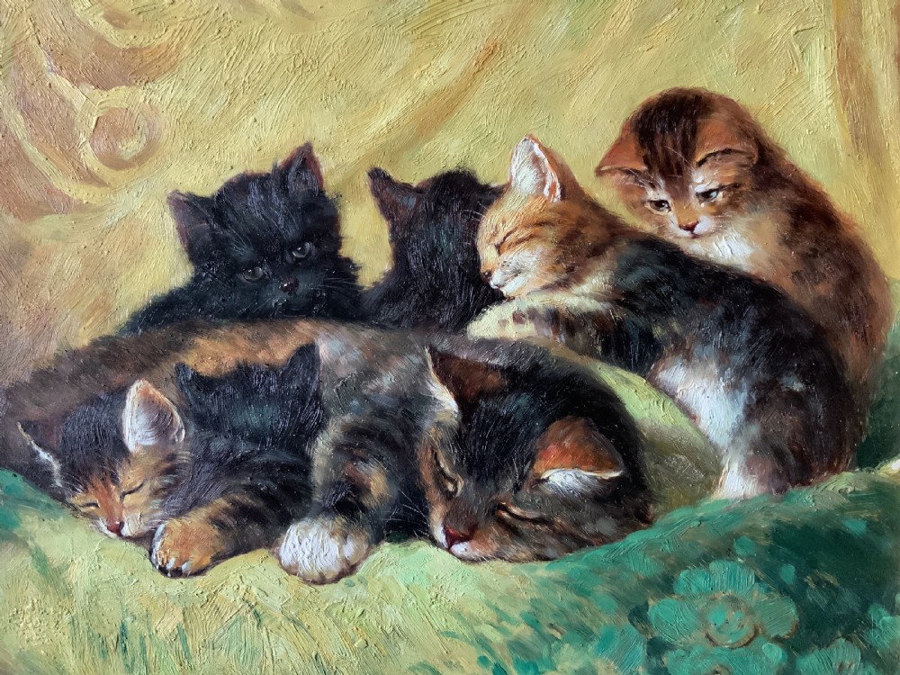 An oil painting on a wooden panel depicting a mother cat and five kittens resting on a green fabric, housed in a wide gilt frame. View V
