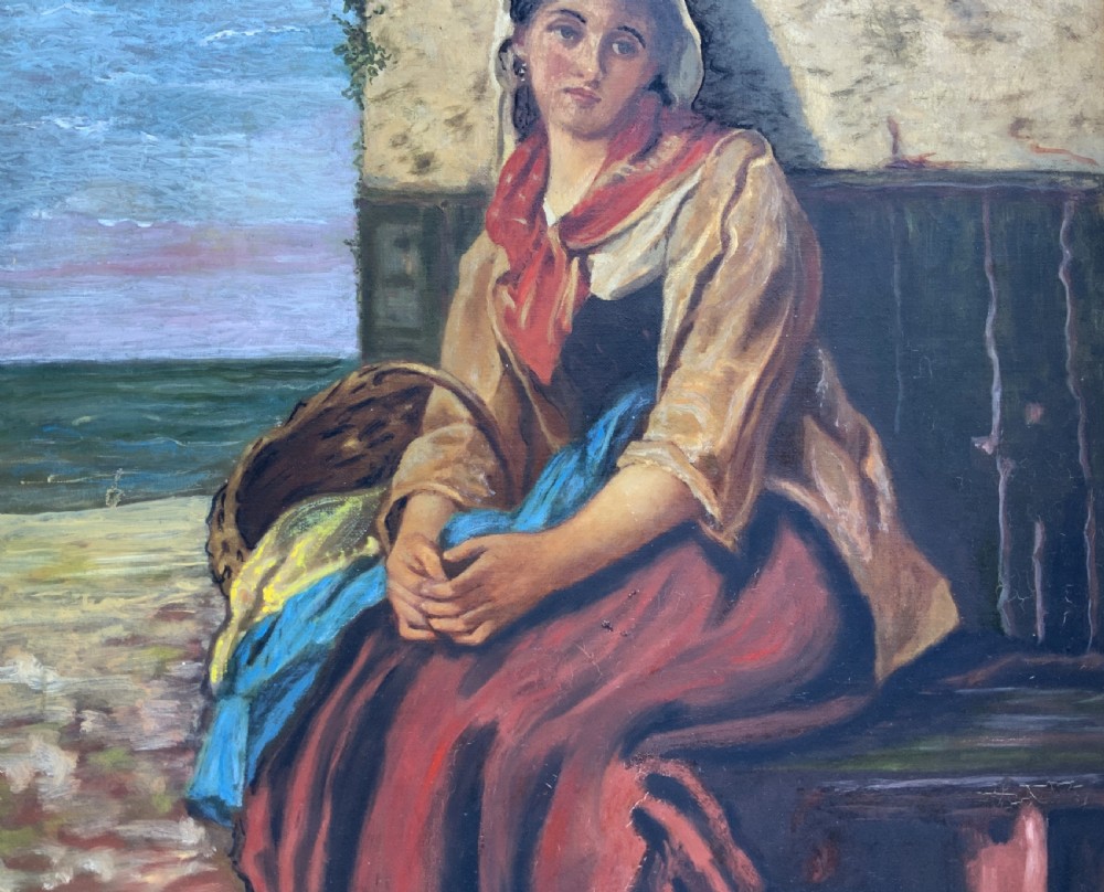 A 19th-century oil painting depicting a young Dutch fisher girl in traditional costume seated near the sea, housed within an ornate gilt wooden frame. View V