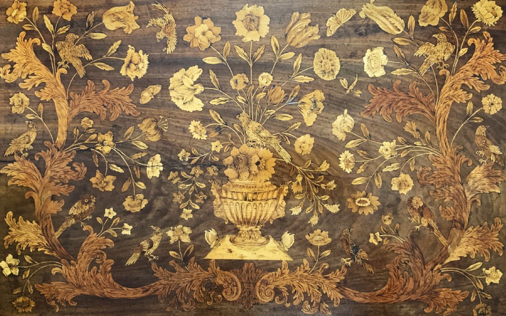 An 18th-century Dutch walnut tea table featuring floral fruitwood marquetry inlays, a tray top, brass handles, and cabriole legs. View VIII