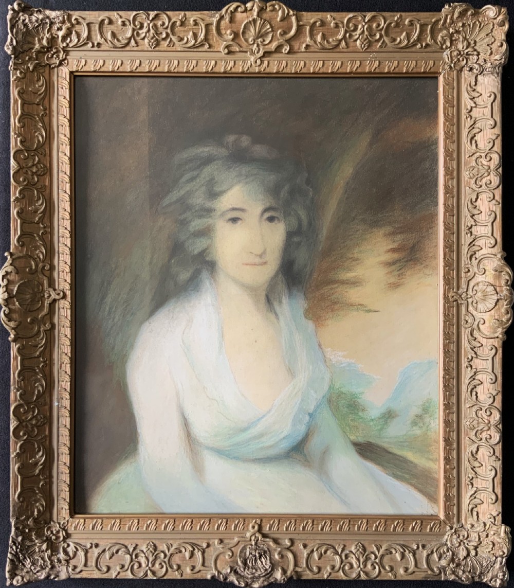 A 19th-century Regency pastel and gouache portrait depicting a woman in a draped white dress, presented in an ornate giltwood frame. View IV