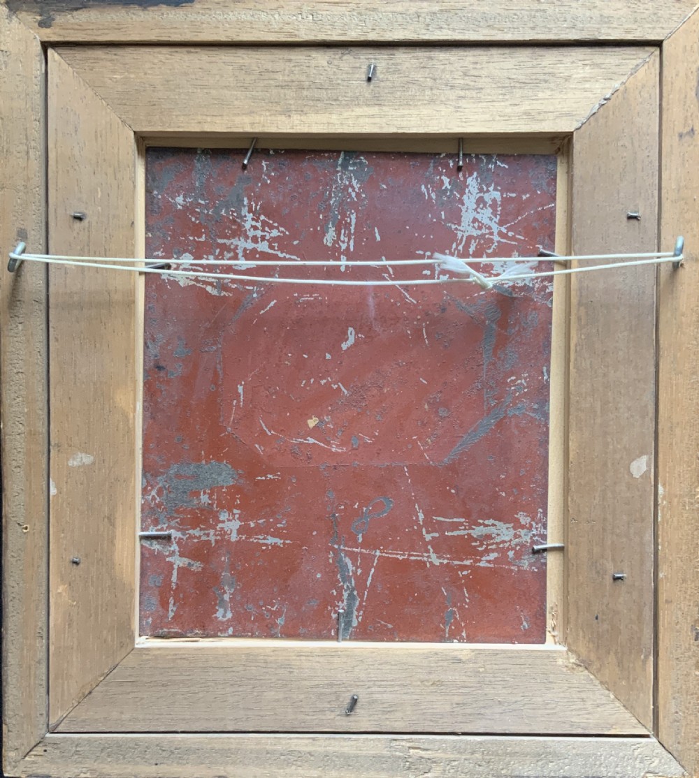An antique oil painting in a deep burr wood frame depicting an older bearded musician playing a bagpipe alongside a child holding an extended hat. View X