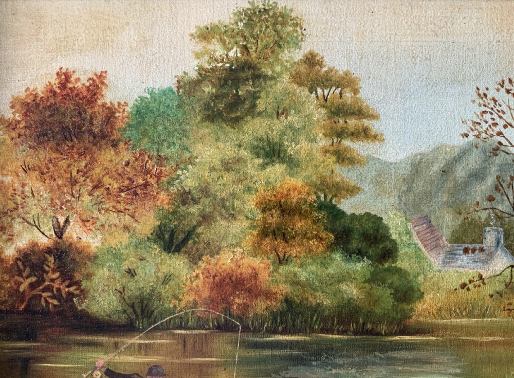 An Edwardian oil painting depicting an angler fly fishing in a river surrounded by trees, enclosed in a moulded gold gilt frame. View XI