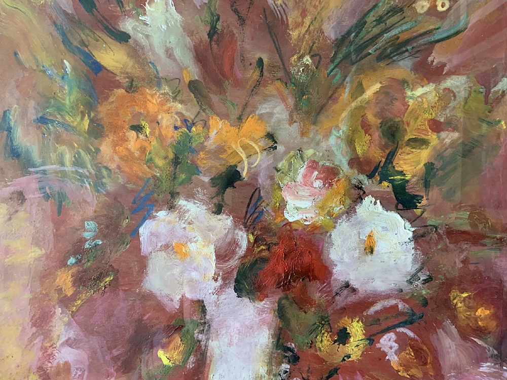 An early 20th-century floral still life oil painting featuring pink and yellow flowers in a light vase, enclosed in a carved giltwood frame. View VIII