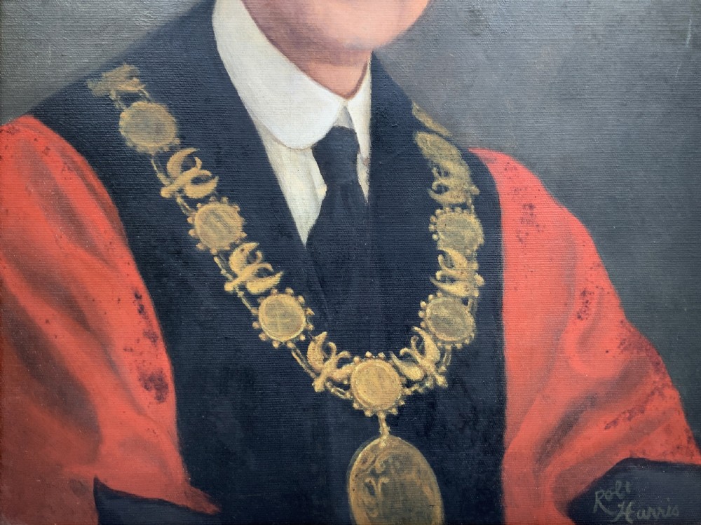 An oil portrait of a bespectacled man with a moustache wearing a tricorne hat, dark tie, red ceremonial robes, and a gold mayors chain of office, presented in a gilded wood frame. View VII