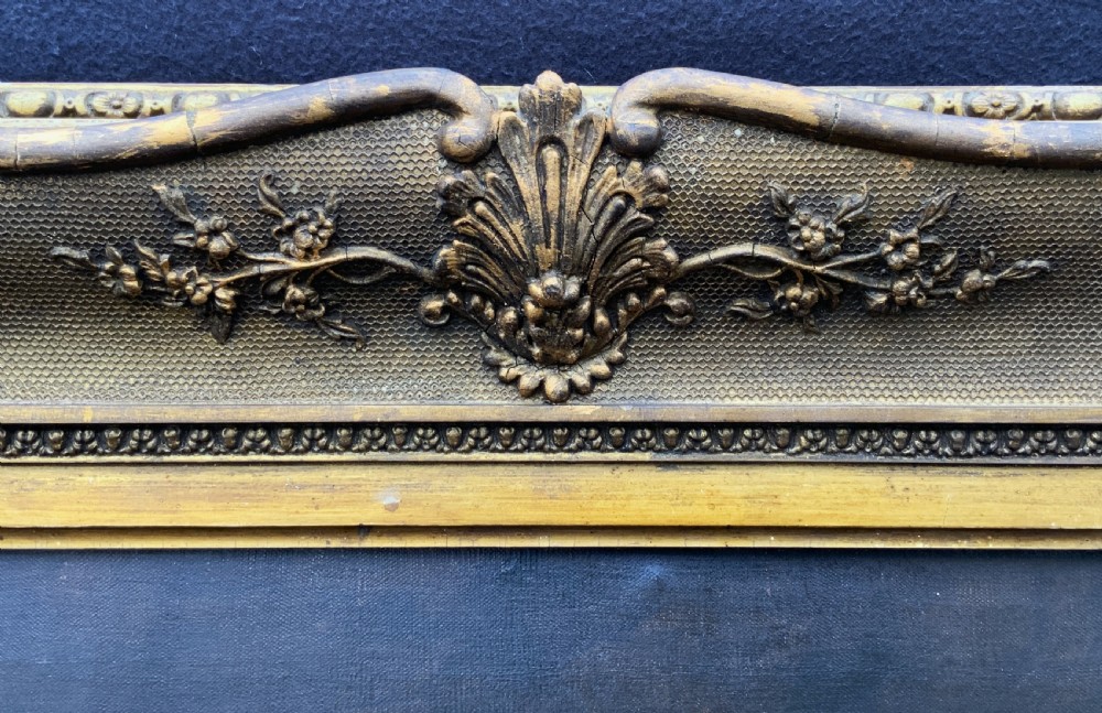 An 18th-century oil portrait of a clergyman in a powdered wig and clerical bands, framed in a carved giltwood frame. View XII