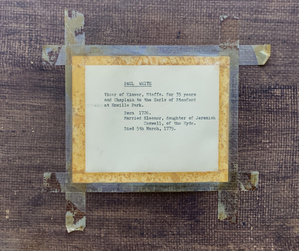An 18th-century oil portrait of a clergyman in a powdered wig and clerical bands, framed in a carved giltwood frame. View XIV