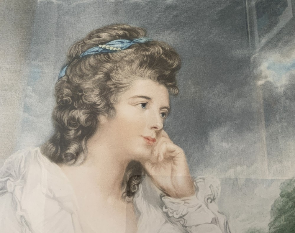 Framed early 20th-century coloured mezzotint print depicting a profile portrait of a lady in a white dress with a blue sash, signed in pencil by Sydney Wilson. View V