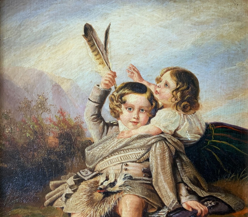 A 19th-century framed oil painting depicting two young children in traditional Scottish Highland dress set within a molded timber frame. View II