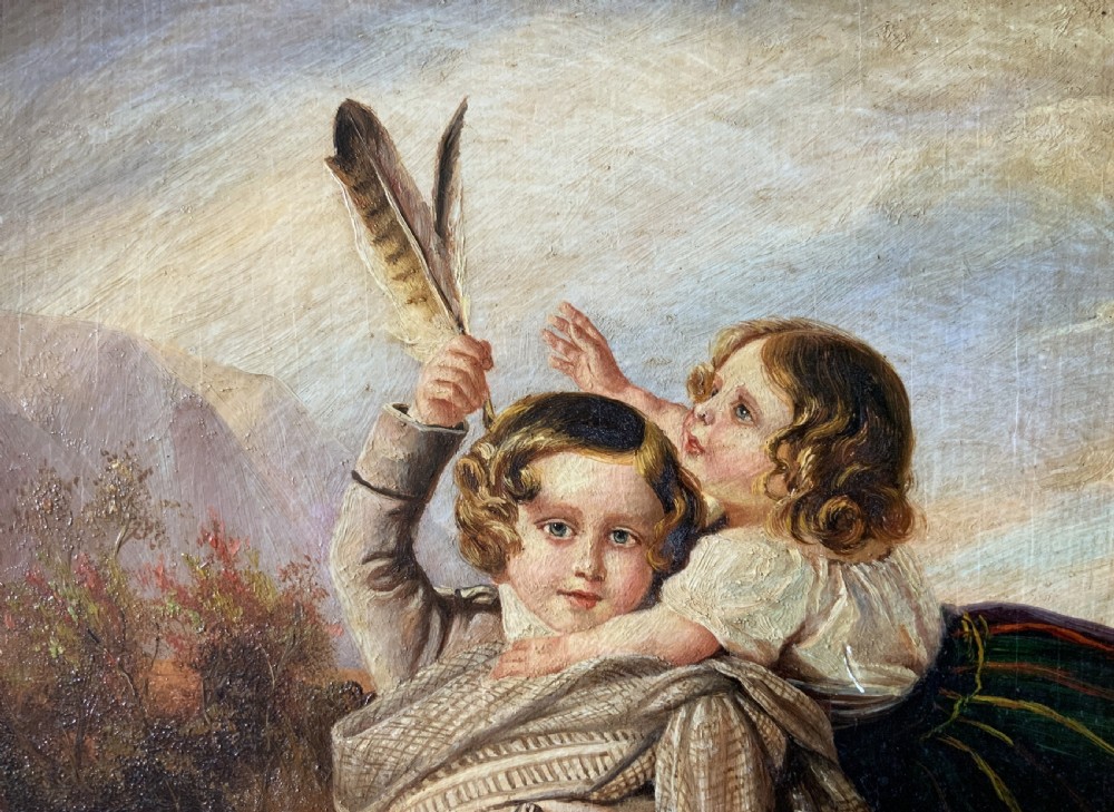A 19th-century framed oil painting depicting two young children in traditional Scottish Highland dress set within a molded timber frame. View VII