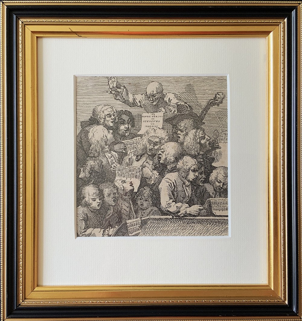 A framed monochrome etching depicting a group of 18th-century choir singers holding music scores, set within a cream mount and a black and gold moulding frame.