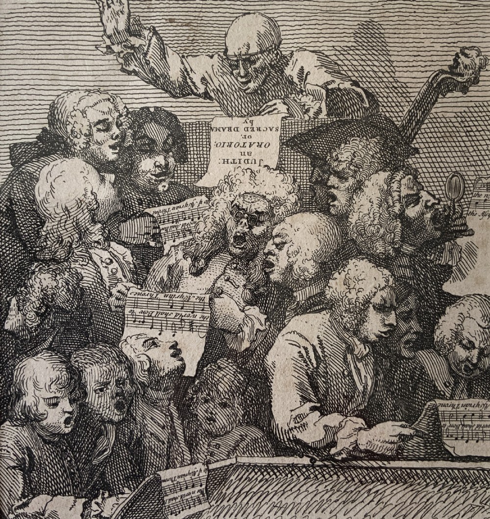 A framed monochrome etching depicting a group of 18th-century choir singers holding music scores, set within a cream mount and a black and gold moulding frame. View II