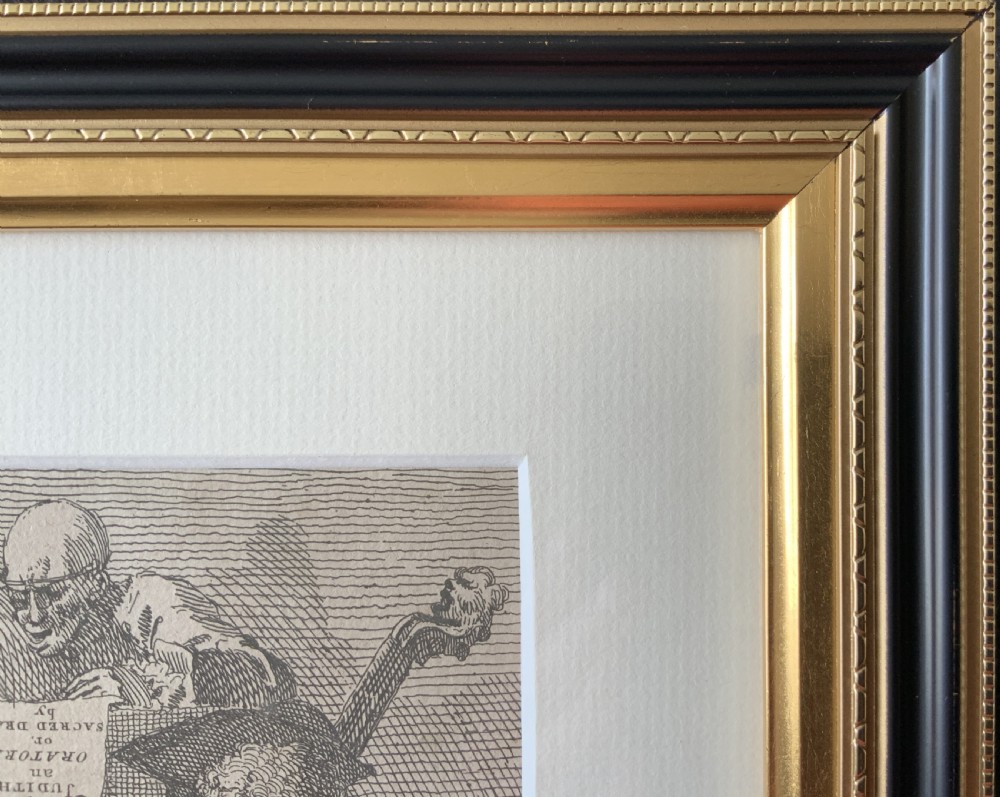 A framed monochrome etching depicting a group of 18th-century choir singers holding music scores, set within a cream mount and a black and gold moulding frame. View IX
