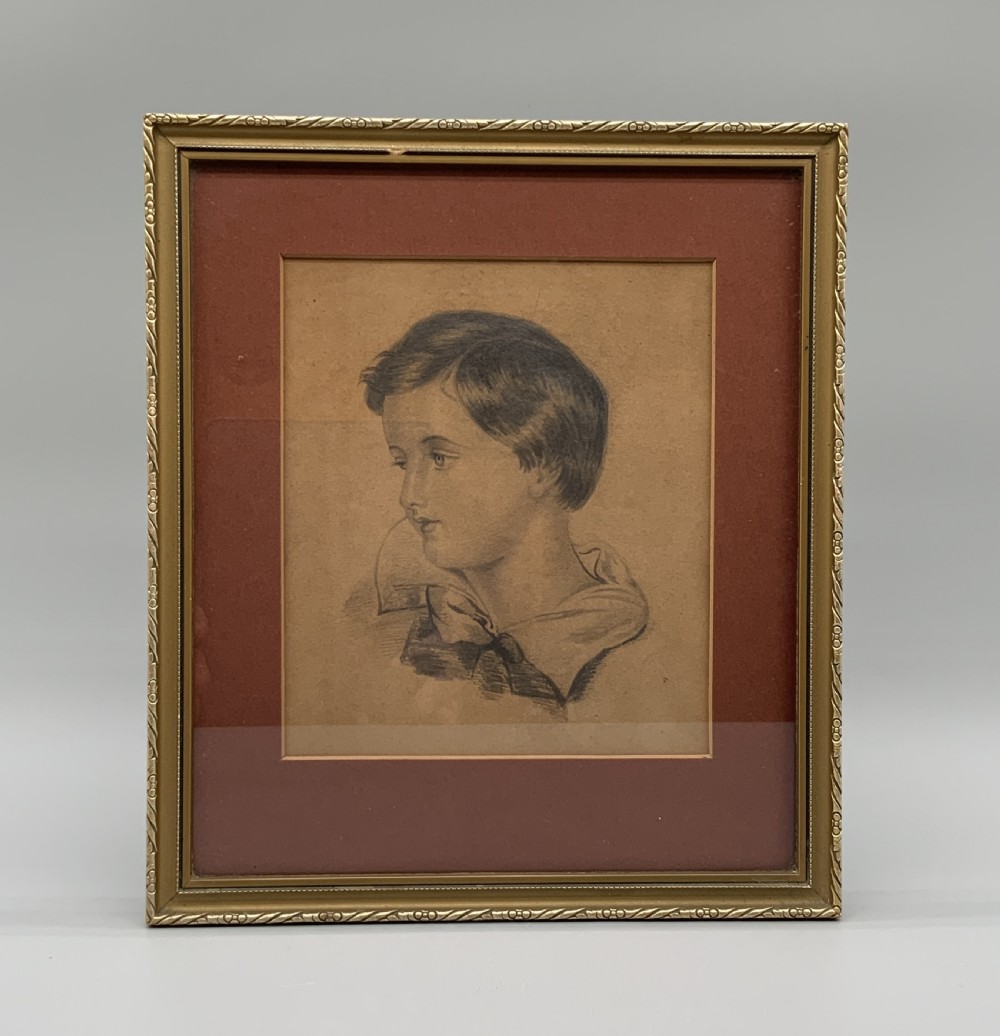 Pair of 19th-century pencil portrait drawings depicting children in gilded frames with reddish-brown mounts. View VI