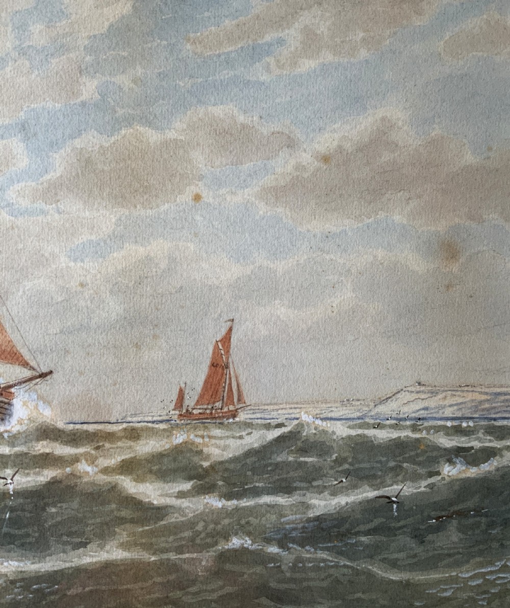 A framed Victorian watercolour painting depicting sailing vessels on a choppy sea off Beachy Head, presented within a gold gilt frame and mount. View VI