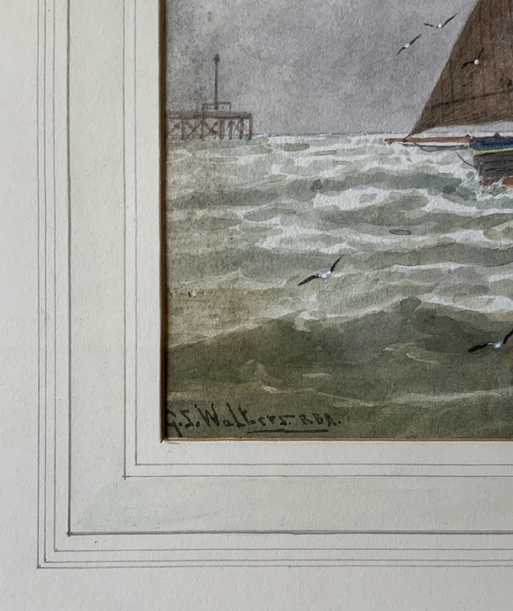 Framed Victorian watercolour painting featuring sailing barges with brown sails on choppy green waters under a cloudy sky. View X