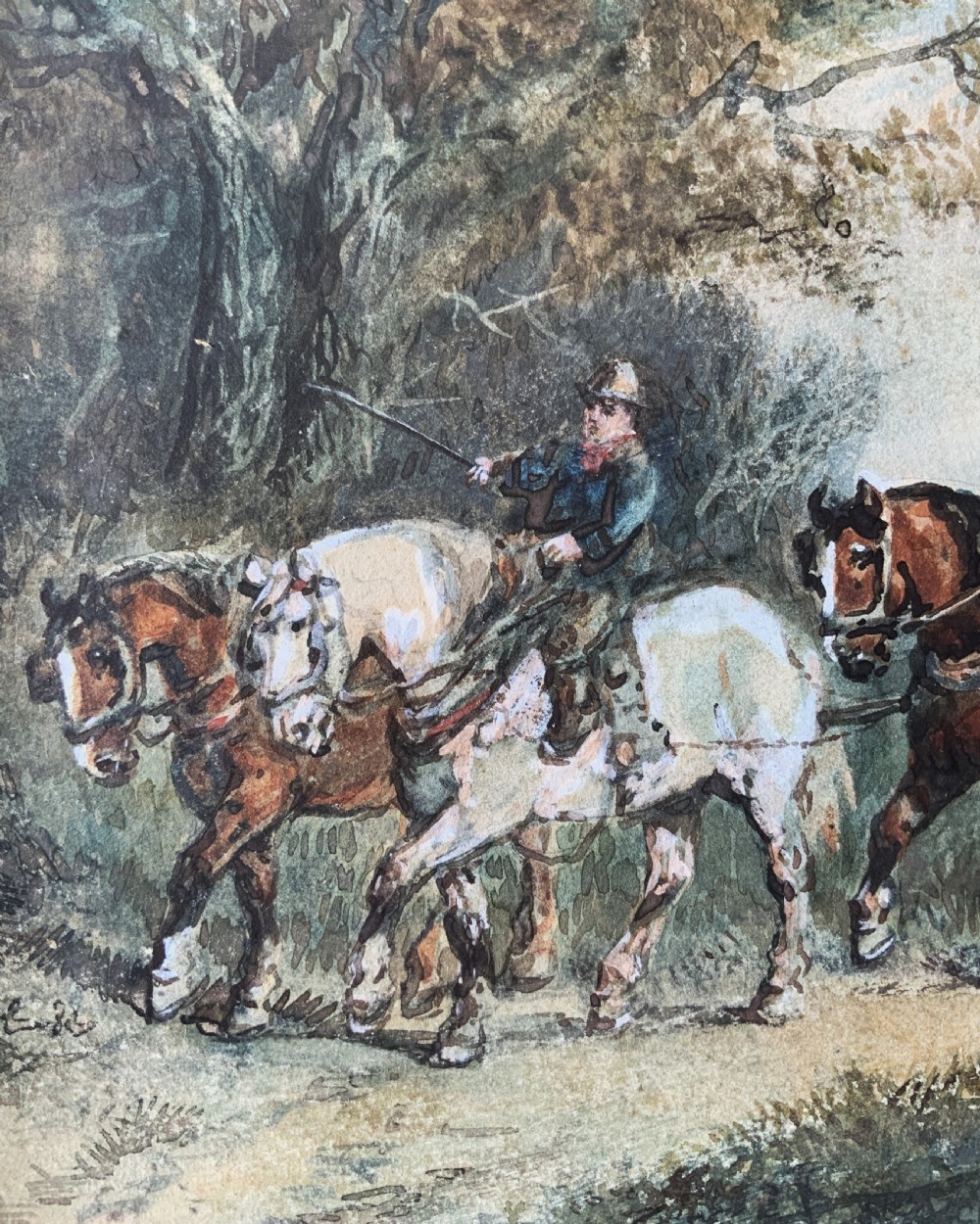 A 19th-century watercolour painting depicting draft horses pulling a timber cart along a dirt path, enclosed in a carved gilt wood frame. View V