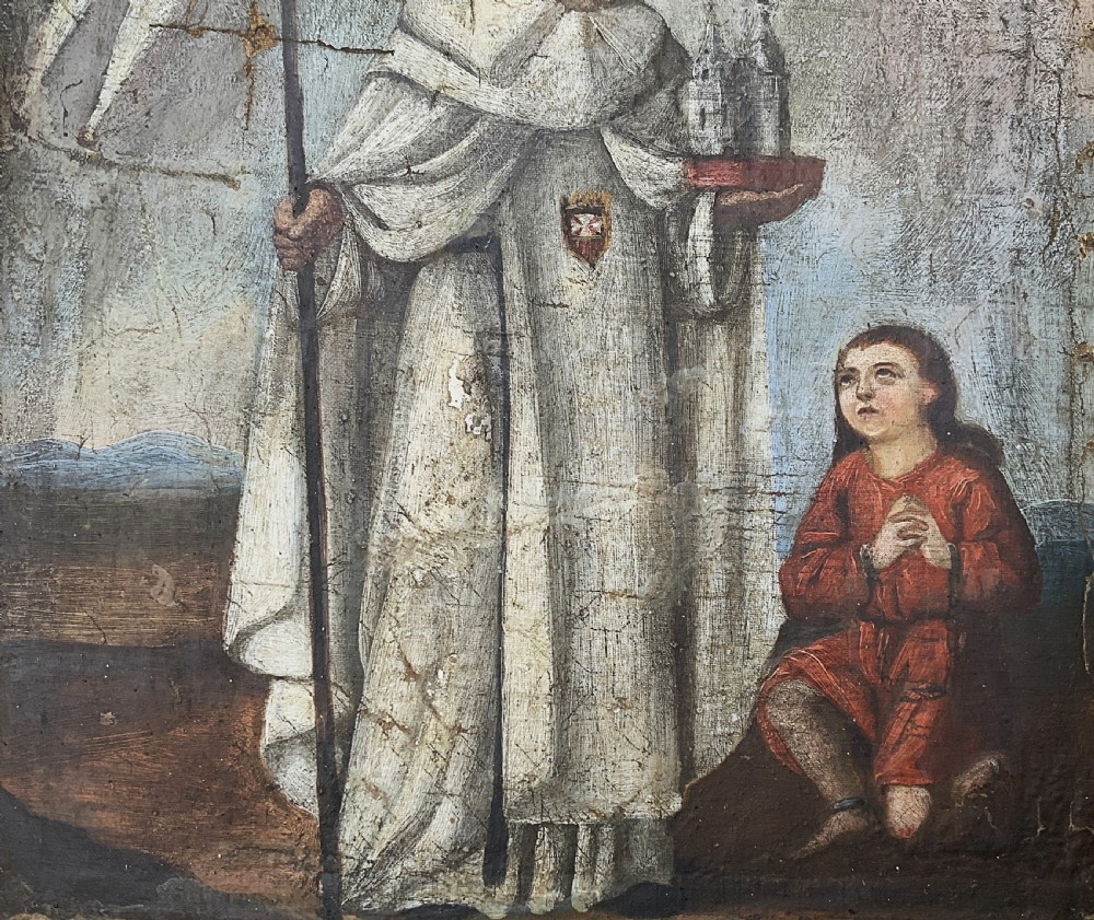 A 17th-century Spanish Baroque oil painting depicting a saint in a habit holding a banner alongside a kneeling figure, housed within an ornate carved giltwood lattice frame with mirrored glass inserts. View IX