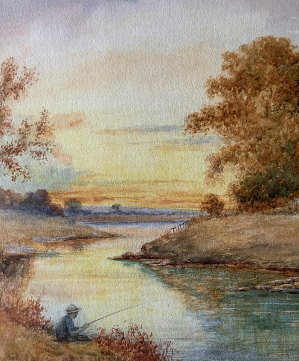 Framed antique watercolour painting depicting a figure fishing along a riverbank at sunset beside trees and cottages. View IV