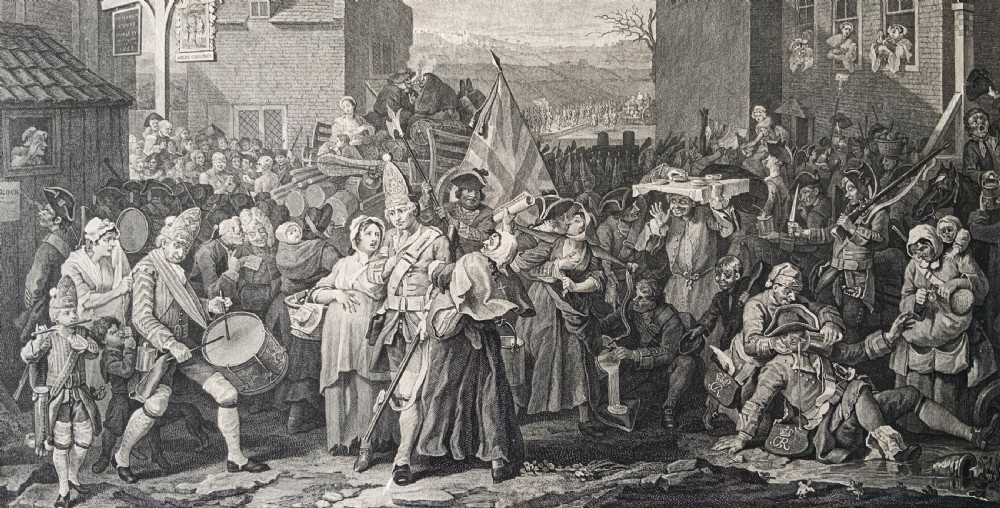 An 18th-century black and white satirical engraving depicting a crowded street scene with soldiers, housed in a black and gold frame with a cream mount. View V