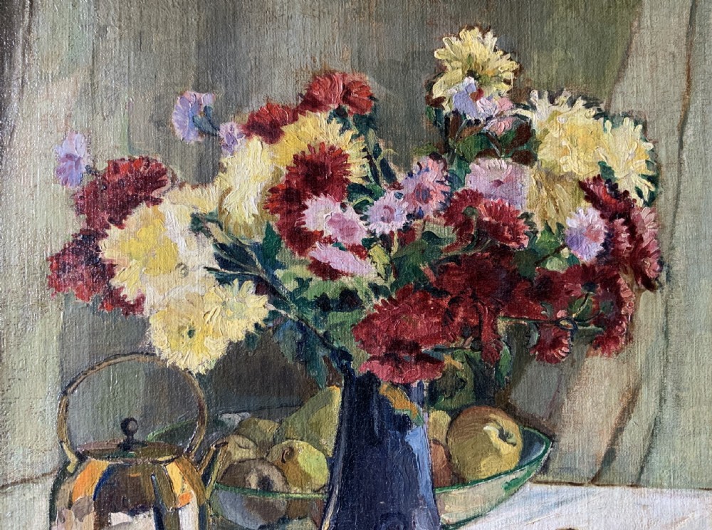 A framed 1931 impressionist oil painting depicting a vase of colourful flowers, a brass kettle, and fruit on a white draped table. View V