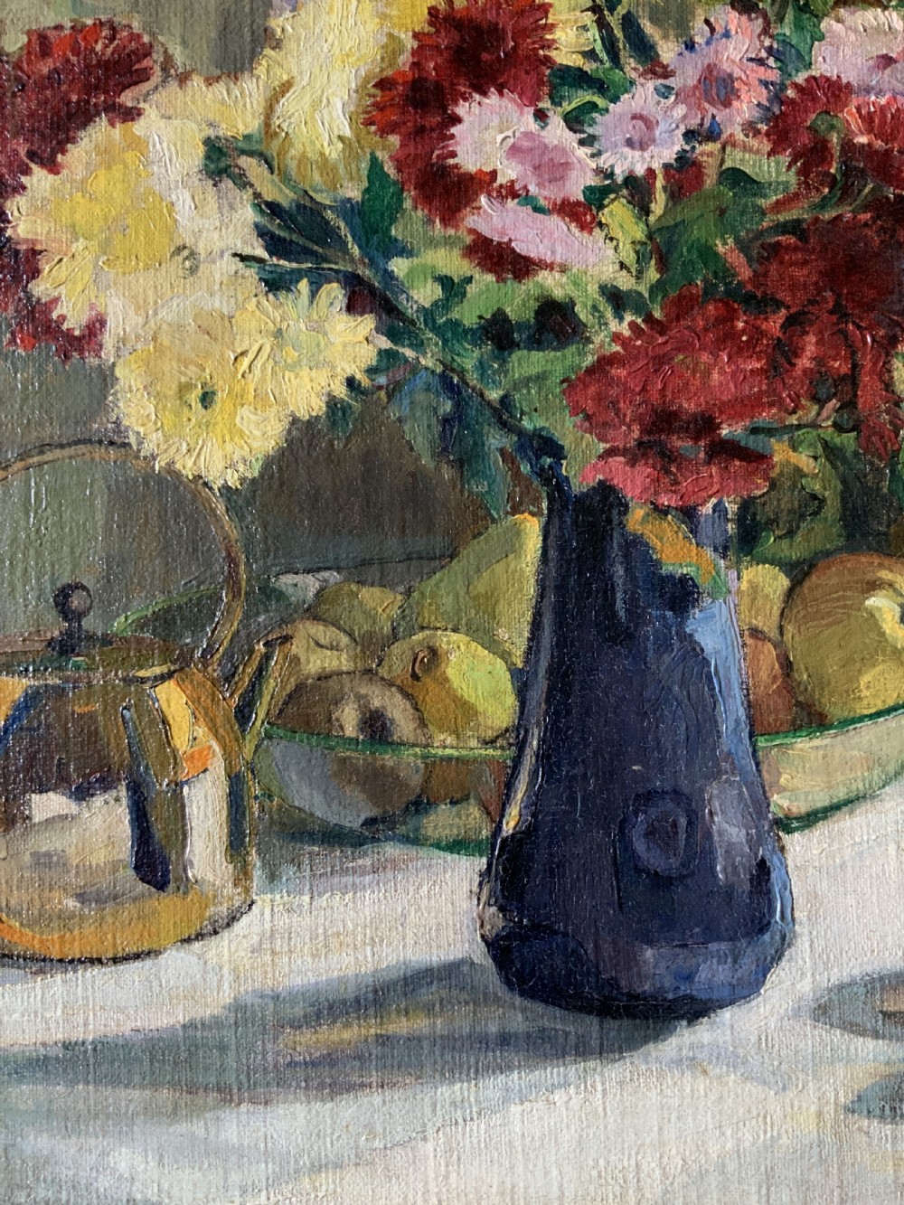 A framed 1931 impressionist oil painting depicting a vase of colourful flowers, a brass kettle, and fruit on a white draped table. View VIII