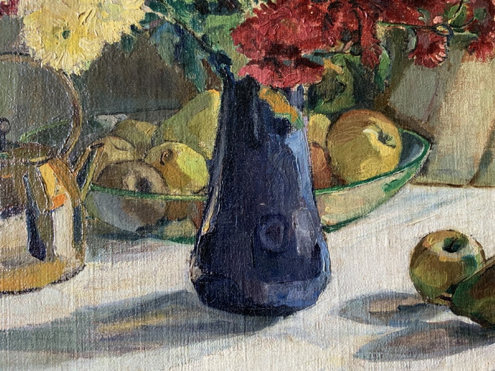 A framed 1931 impressionist oil painting depicting a vase of colourful flowers, a brass kettle, and fruit on a white draped table. View XIII