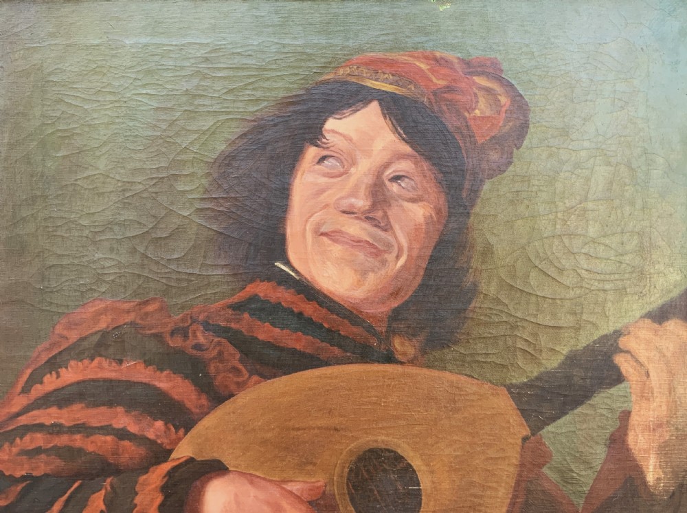 An oil painting on canvas depicting a seated musician playing a lute in a red and black striped tunic against an olive green background, housed within a dark carved frame. View VI