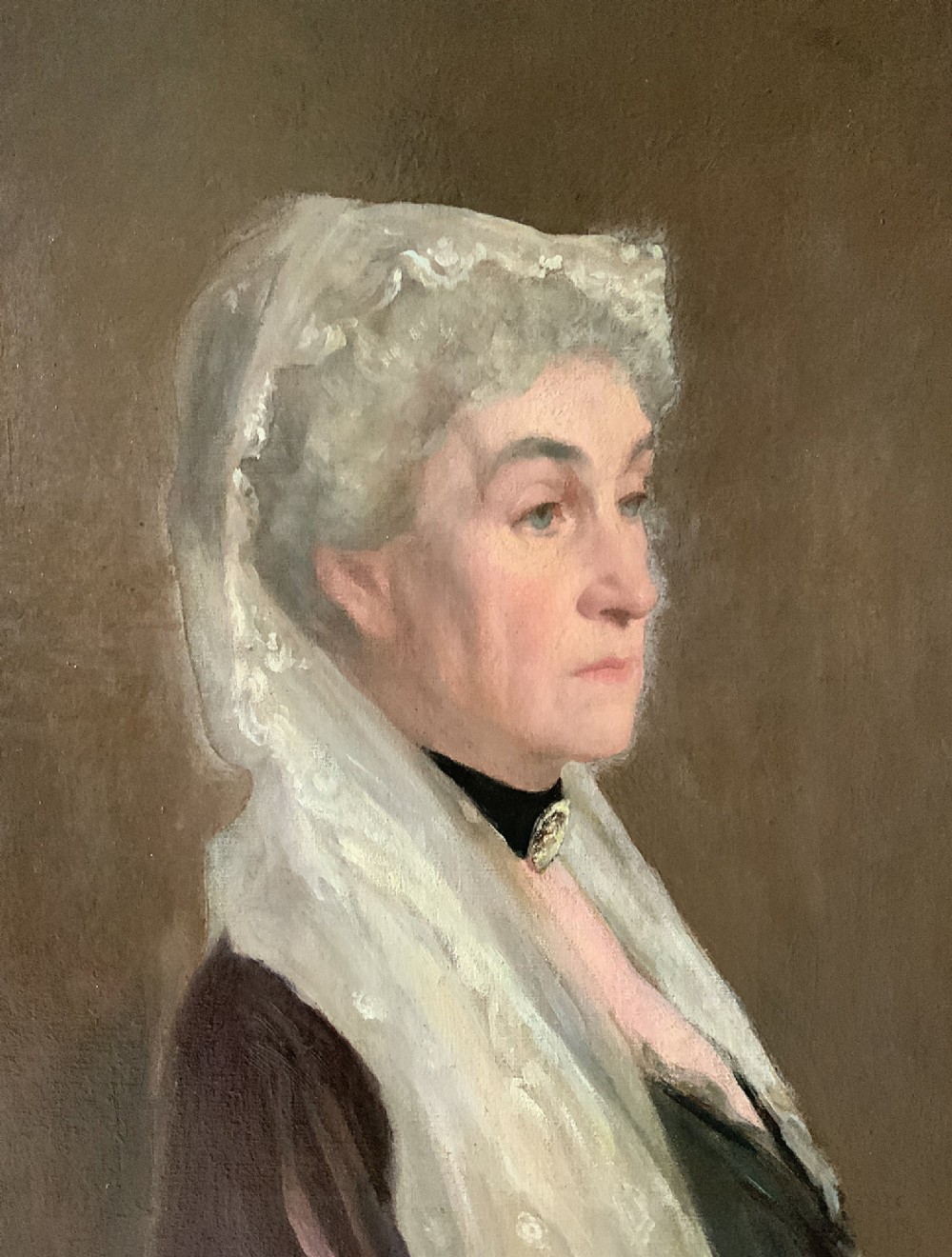 A pair of large 19th-century oil paintings depicting a gentleman in military uniform and a lady in formal dress, framed in heavy gilded mouldings. View XIII