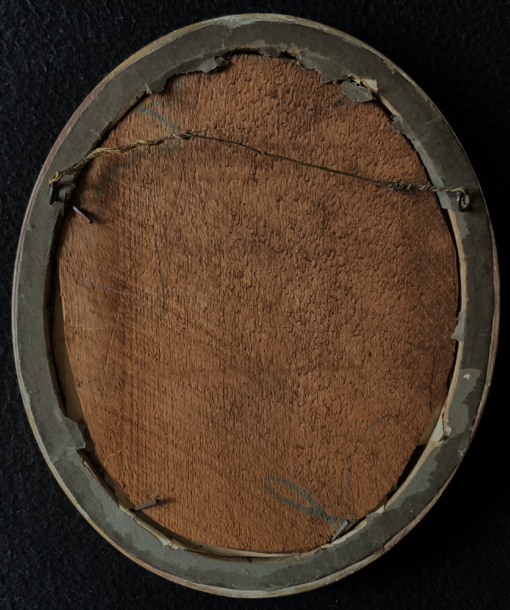 An oval Victorian miniature watercolour portrait of an elderly gentleman in a dark suit, set within a gilded frame. View XI