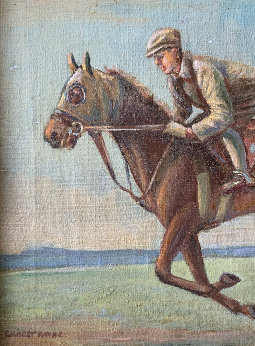An antique oil painting depicting a jockey riding a brown racehorse across a green landscape against a blue sky, set within a gilded frame. View VIII
