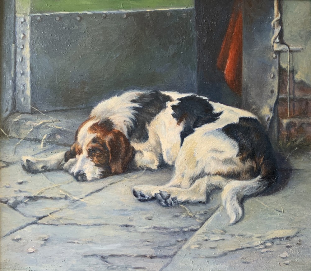 An oil painting depicting a resting tri-colour foxhound lying on a stone floor inside a doorway, housed in an ornate gilt frame. View III