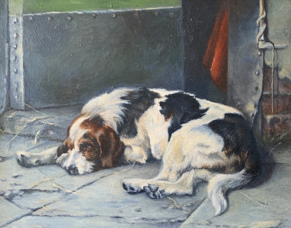 An oil painting depicting a resting tri-colour foxhound lying on a stone floor inside a doorway, housed in an ornate gilt frame. View IV