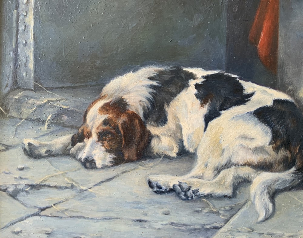 An oil painting depicting a resting tri-colour foxhound lying on a stone floor inside a doorway, housed in an ornate gilt frame. View VI