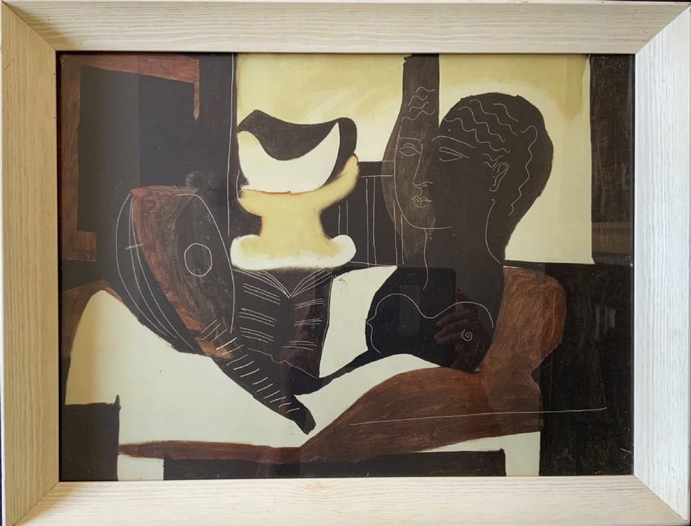 A framed abstract print featuring stylized figures and vessel motifs rendered in brown, cream, and black tones within a light wooden frame.